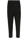 ISSEY MIYAKE HOMME PLISSÉ ISSEY MIYAKE RIBBED CROPPED TROUSERS - BLACK