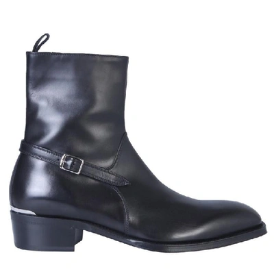 Alexander Mcqueen Buckled Leather Boots In Black