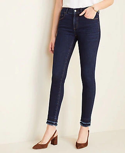 Ann Taylor Frayed Performance Stretch Skinny Jeans In Classic Mid Wash In Blue
