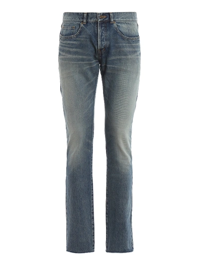 Saint Laurent Bandana Detailed Raw Edge Slim Jeans In Medium Wash