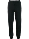Msgm Embroidered Cotton-blend Fleece Track Pants In Black