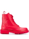 Valentino Garavani Logo Embossed Combat Boot In Red