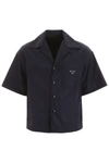 Prada Triangle Logo-plaque Leather Shirt In Navy (blue)