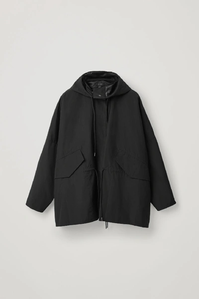 Cos Light Packable Raincoat In Black