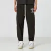 1989 Studio Rodeo Drive Print Track Pants In Brown