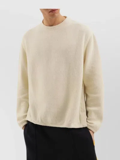 1989 STUDIO RIBBED SWEATER WITH SLITS AND BUTTON DETAIL