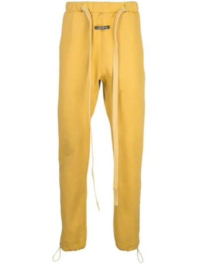 Fear Of God Slim-fit Belted Loopback Cotton-jersey Sweatpants In Yellow