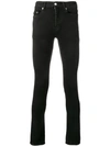 Saint Laurent Zebra Printed Skinny Jeans In Black