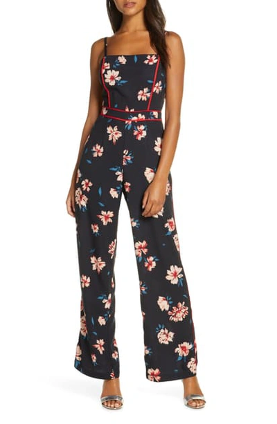 Adelyn Rae Carson Piped Floral Jumpsuit In Navy-cream Multi