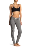 Alo Yoga Twiggy Graphic Sweatpants In Dv Gry Hr/mndful Mvmnt/bl