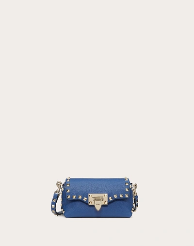 Valentino Garavani Mini Rockstud Grainy Calfskin Crossbody Bag In Baltique