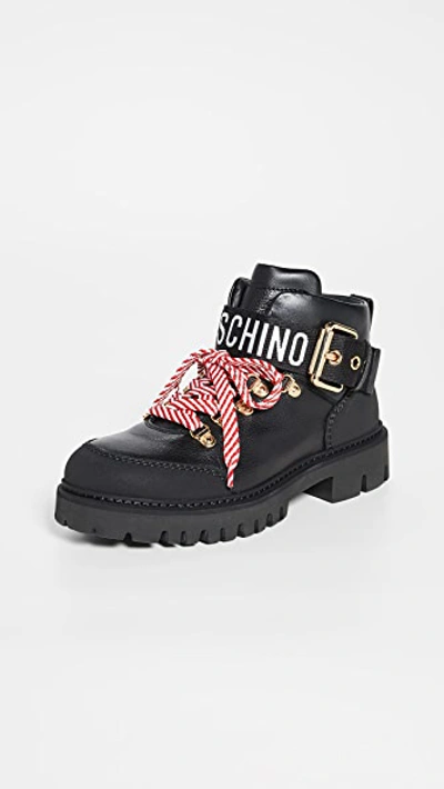 Moschino Logo Tape Ankle Boots In Black