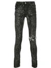 AMIRI LASER SNAKE BROKEN SKINNY JEANS