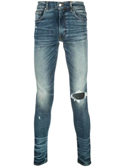 Amiri Ripped Skinny Jeans In Blue