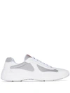 PRADA PRADA WHITE AND SILVER TONE AMERICAS CUP LOW TOP PATENT LEATHER SNEAKERS - 白色
