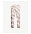 GUCCI LOGO-PRINT WOVEN JOGGING BOTTOMS