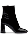 Prada Block Heel Patent Leather Bootie In Black
