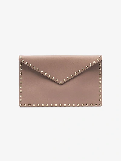 Valentino Garavani Valentino Pink  Rockstud Leather Envelope Pouch In P45 Poudre