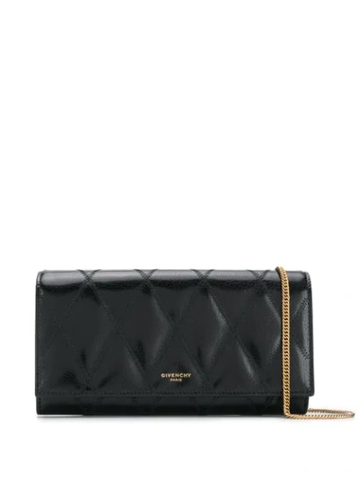 Givenchy Logo Embossed Quilted Clutch In Black