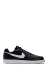 Nike Blazer Low Sb Sneakers In 002 Black/white