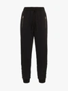 HAIDER ACKERMANN HAIDER ACKERMANN LAYERED CUFF CROPPED TRACK TROUSERS,194642022209614028373