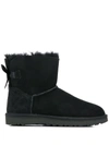Ugg Mini Bailey Bow Ii Shearling Fur Boots In Black