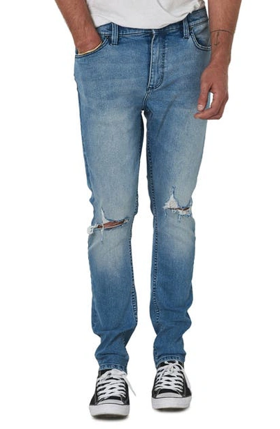 Rolla's Tim Slims Fast Times Worn Destroyed Slim Fit Jeans In Light Blue