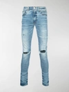Amiri Distressed Skinny Jeans In Blue