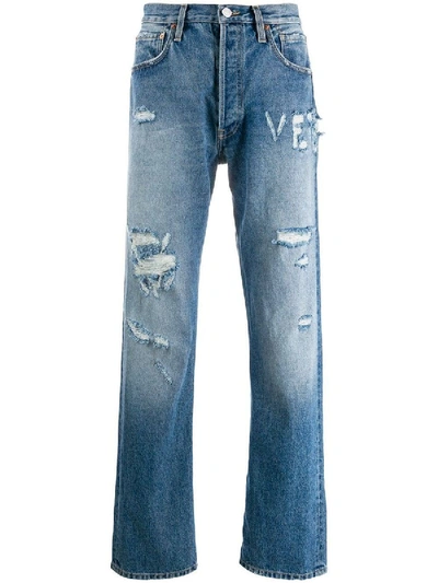 Vetements Distressed Logo Jeans In Blue