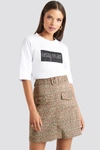 EMILIE BRITING X NA-KD FRONT POCKET CHECKED SKIRT - BROWN