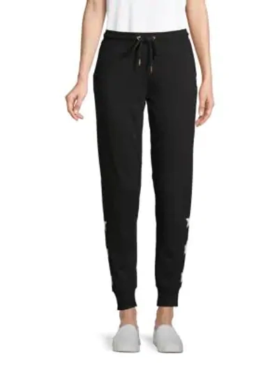 Andrew Marc Star-print Cotton-blend Jogger Trousers In Black