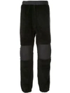 UNDERCOVER SHEARLING DETAIL TROUSERS