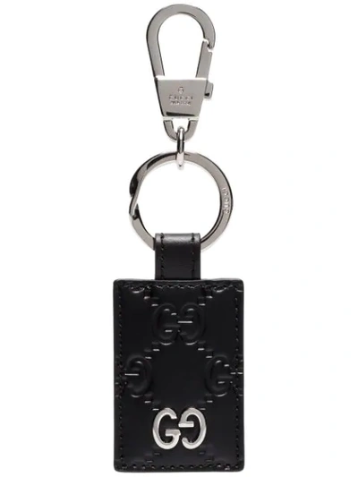 Gucci Gg Pattern Embossed Keychain In Black