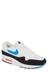 Nike Air Max 1 Sneakers In White/ Photo Blue/ Orange
