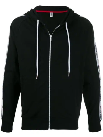 Moschino Logo Tape Zipped Hoodie In Black