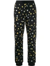 MOSCHINO COIN PRINT TRACK TROUSERS