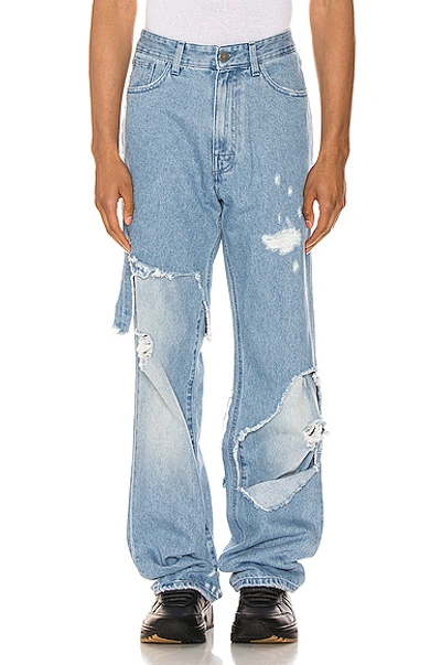 Raf Simons Destroyed Denim Pants In Light Blue | ModeSens