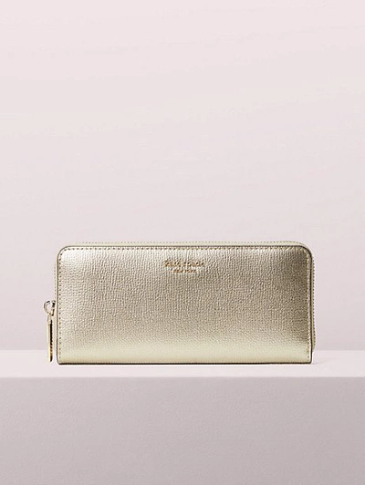 Kate Spade Sylvia Slim Continental Wallet In Pale Gold
