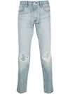 LEVI'S RIPPED DETAIL TAPERED JEANS