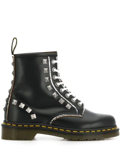 Dr. Martens' 1460 Combat Boot In Black Leather With Studs