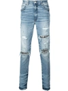 Amiri 15cm Music Note Patch Cotton Denim Jeans In Blue