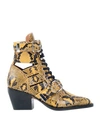 Chloé Python Print Rylee Boots In Yellow