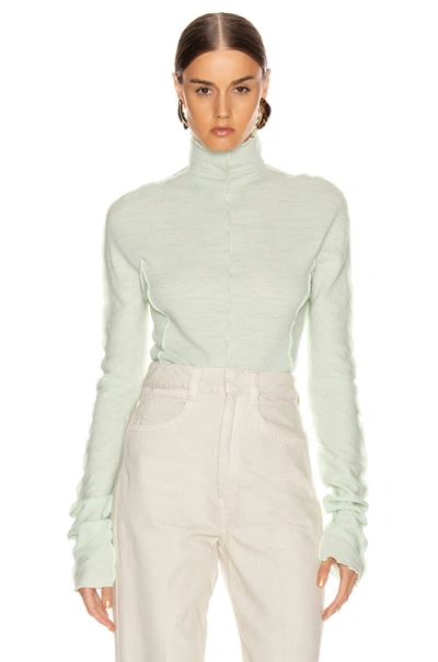 Jil Sander High Neck Long Sleeve Top In Pale Blue