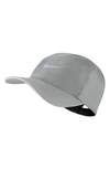 Nike Featherlight Run Cap In Ptclgy/refsil