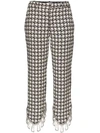 AREA ASYMMETRIC EMBELLISHED HOUNDSTOOTH TROUSERS