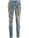 OFF-WHITE GRAFFITI PRINT SKINNY JEANS