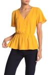 Collective Concepts V-neck Button Peplum Blouse In Mustard