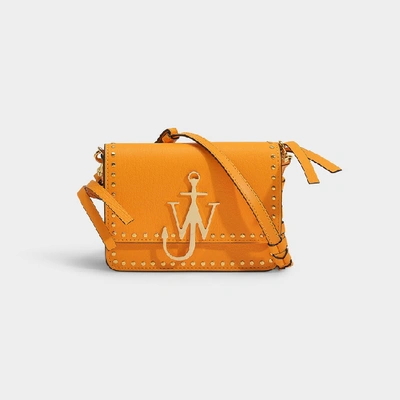 Jw Anderson Logo Bag In Yellow Studded Leather