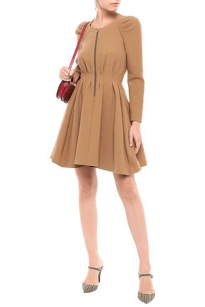 Maje Flared Pleated Twill Mini Dress In Camel