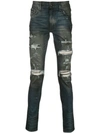 AMIRI cashmere patch skinny jeans